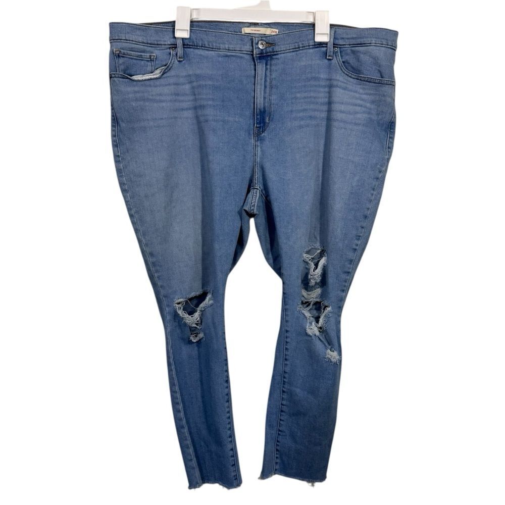 Levi's 711 Medium Wash Lightly Distressed Skinny Jeans